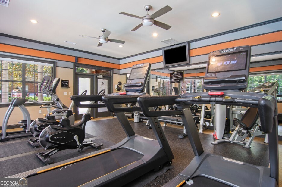 100 Ladson Court, Unit 513 Decatur, GA 30033 - Photo 14 of 20 a room with gym equipment and a large window