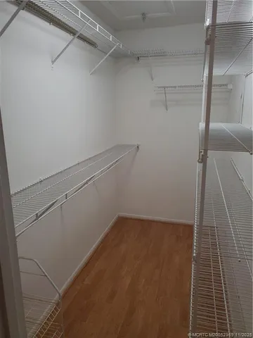 a view of a room with racks on the wall