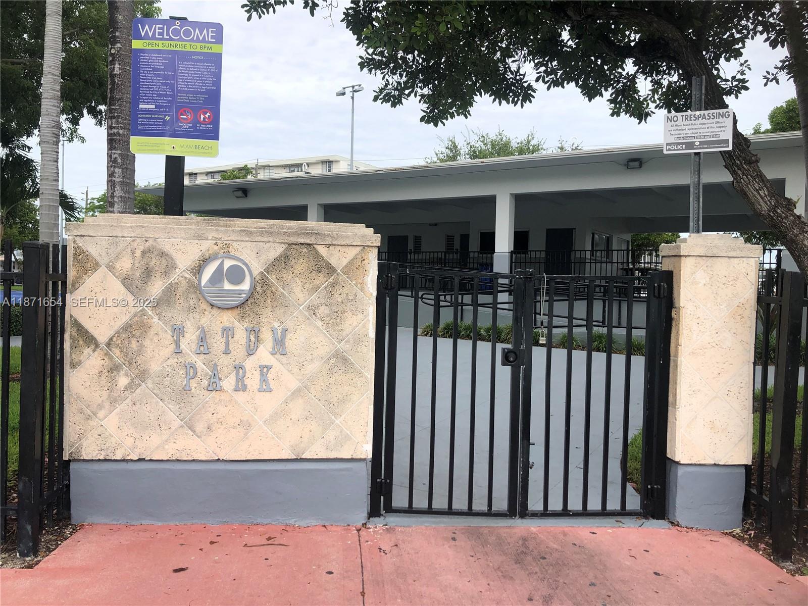 8100 Byron Avenue, Unit 509 Miami Beach, FL 33141 - Photo 17 of 18 a front view of a house with a garage