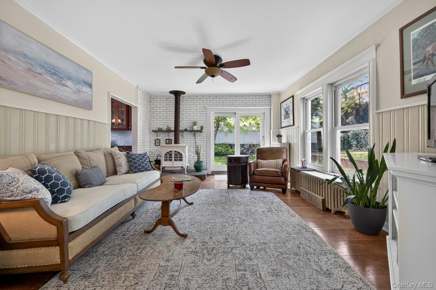 17 Riggs Place Locust Valley, NY 11560 - Photo 12 of 25 Den with Jotul wood stove