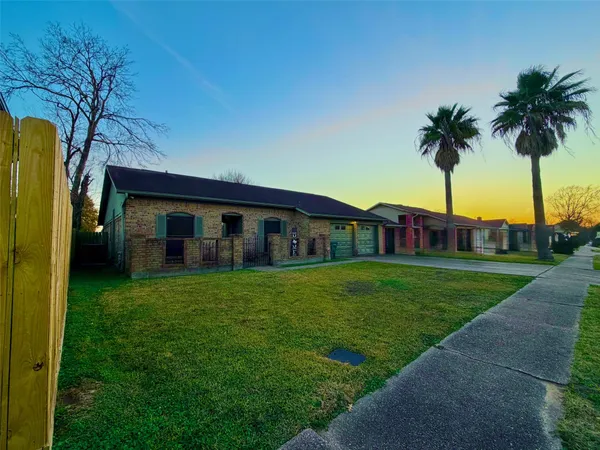 a view of a livingroom with wooden floor