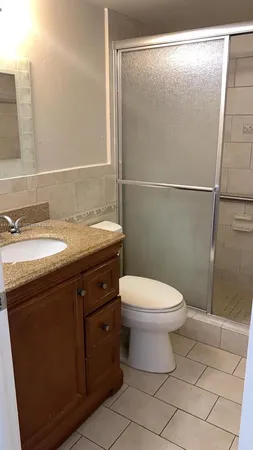 a bathroom with a sink and a toilet