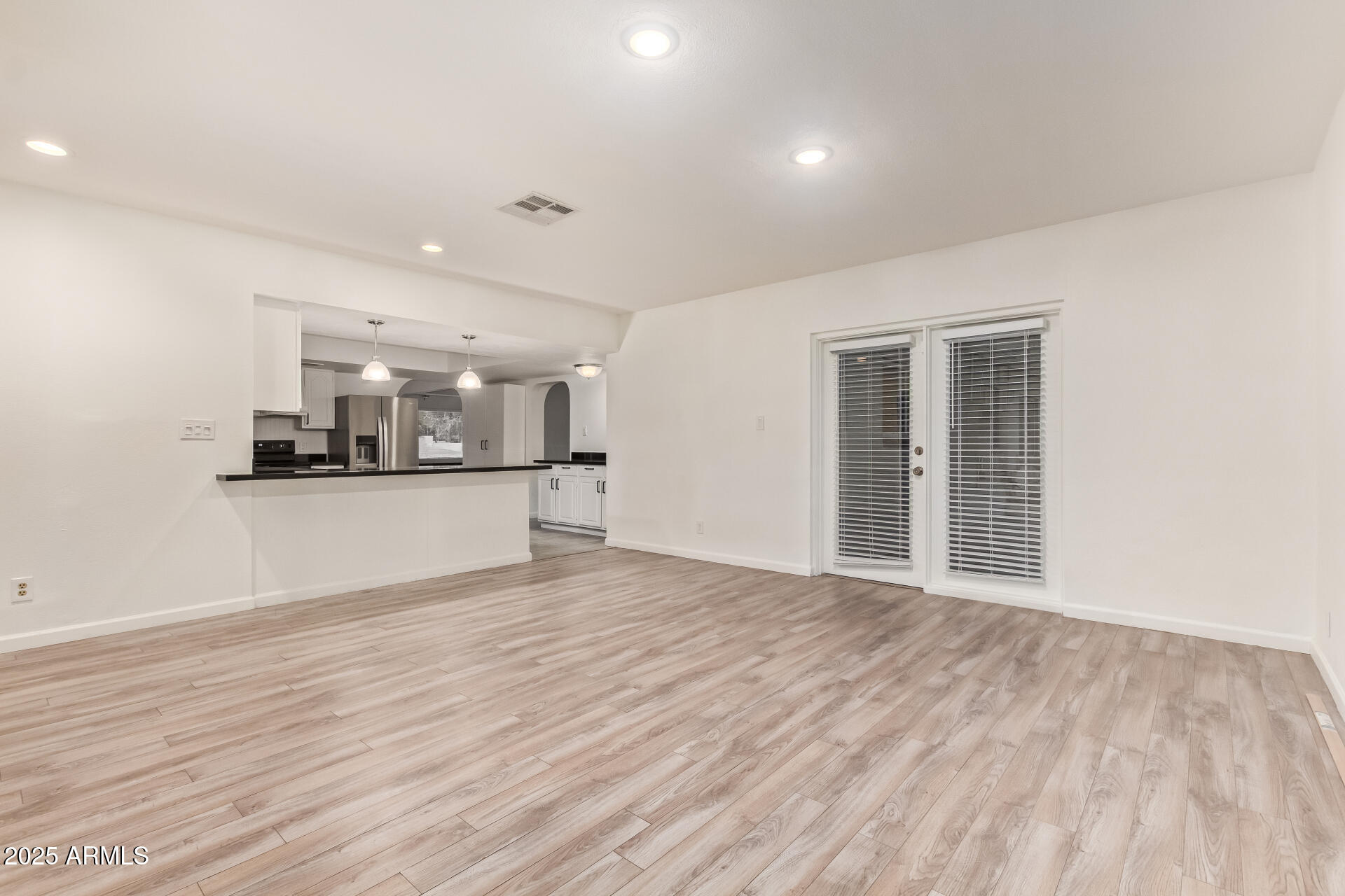 5401 East Exeter Boulevard Phoenix, AZ 85018 - Photo 18 of 47 a view of a kitchen with a sink and wooden floor