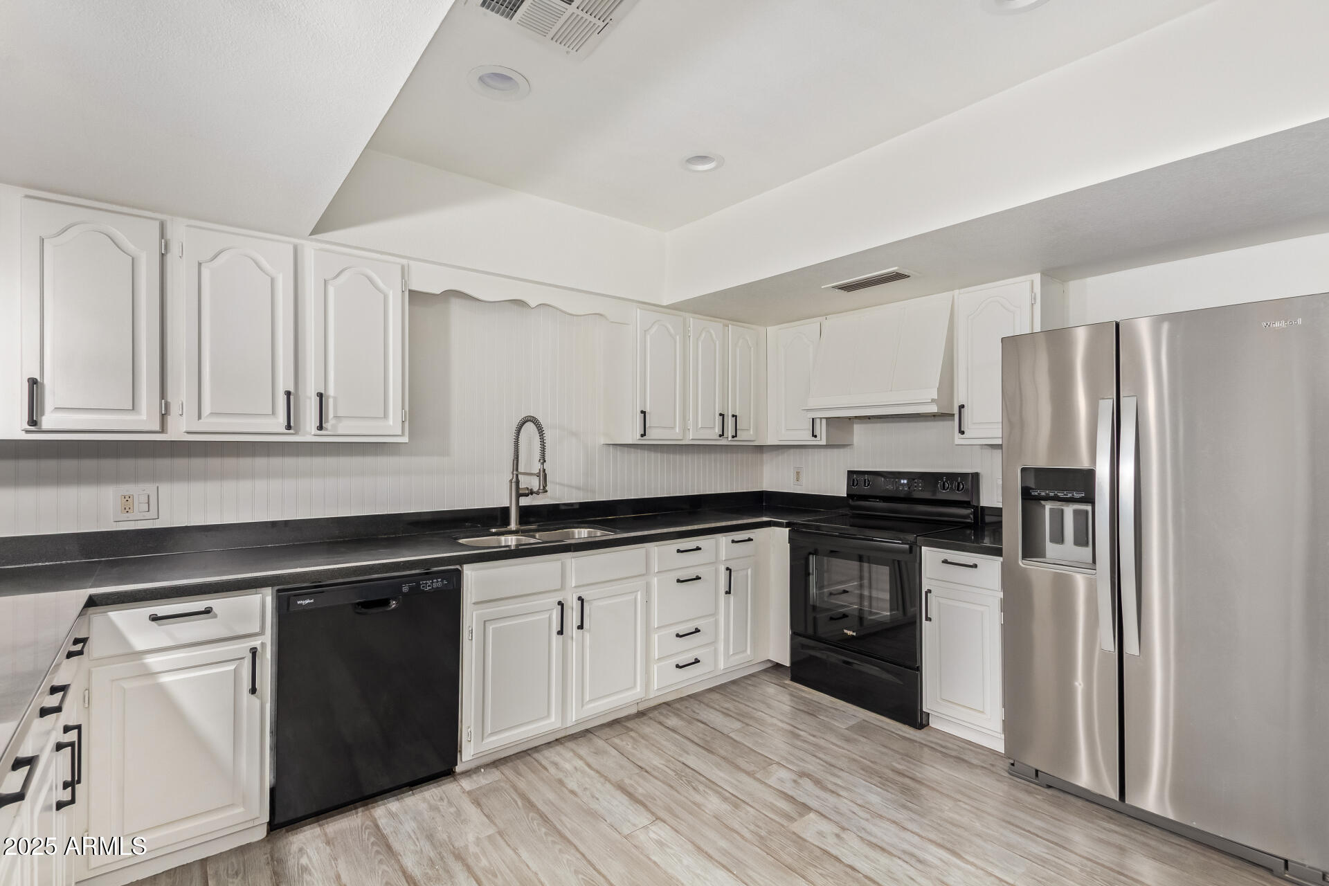 5401 East Exeter Boulevard Phoenix, AZ 85018 - Photo 22 of 47 a kitchen with granite countertop a sink stove and refrigerator