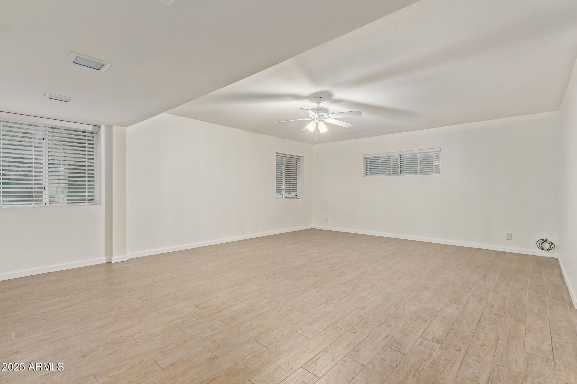 5401 East Exeter Boulevard Phoenix, AZ 85018 - Photo 24 of 47 a view of an empty room with a window