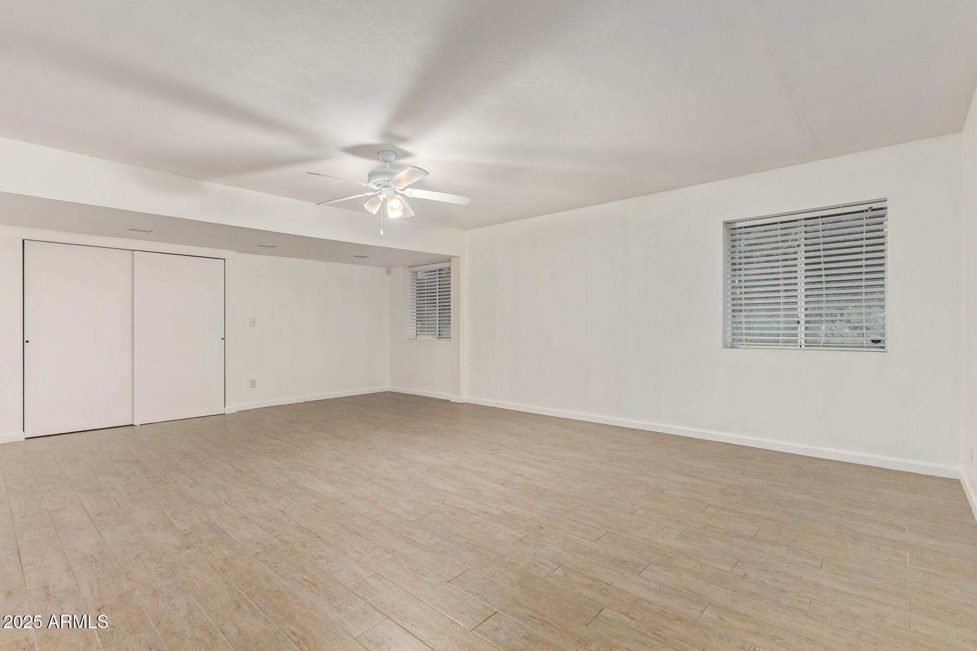 5401 East Exeter Boulevard Phoenix, AZ 85018 - Photo 27 of 47 a view of an empty room with a window