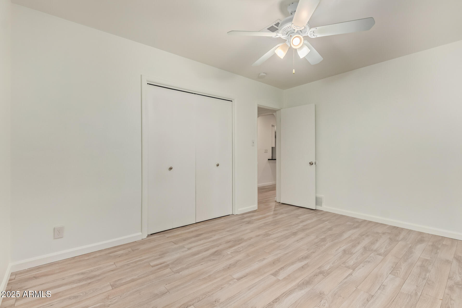 5401 East Exeter Boulevard Phoenix, AZ 85018 - Photo 34 of 47 wooden floor in an empty room