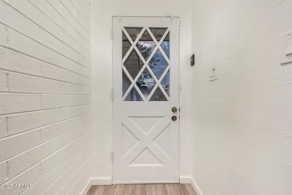 a picture of a window with a fan