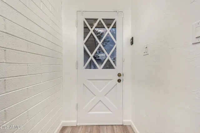 a picture of a window with a fan