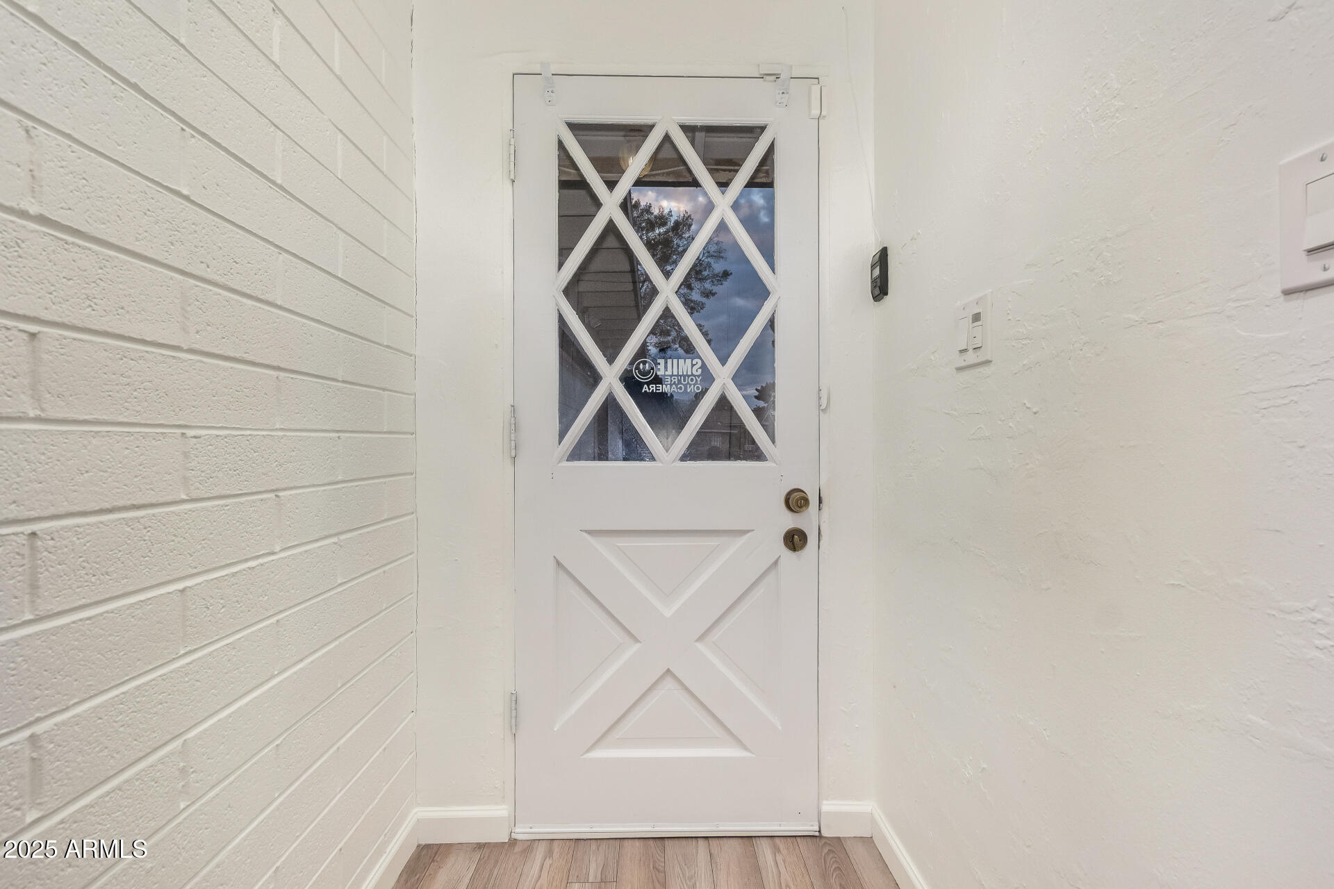 5401 East Exeter Boulevard Phoenix, AZ 85018 - Photo 38 of 47 a picture of a window with a fan