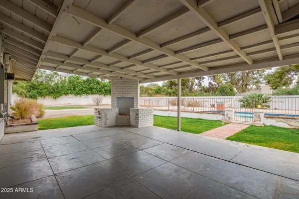 a view of a backyard with porch