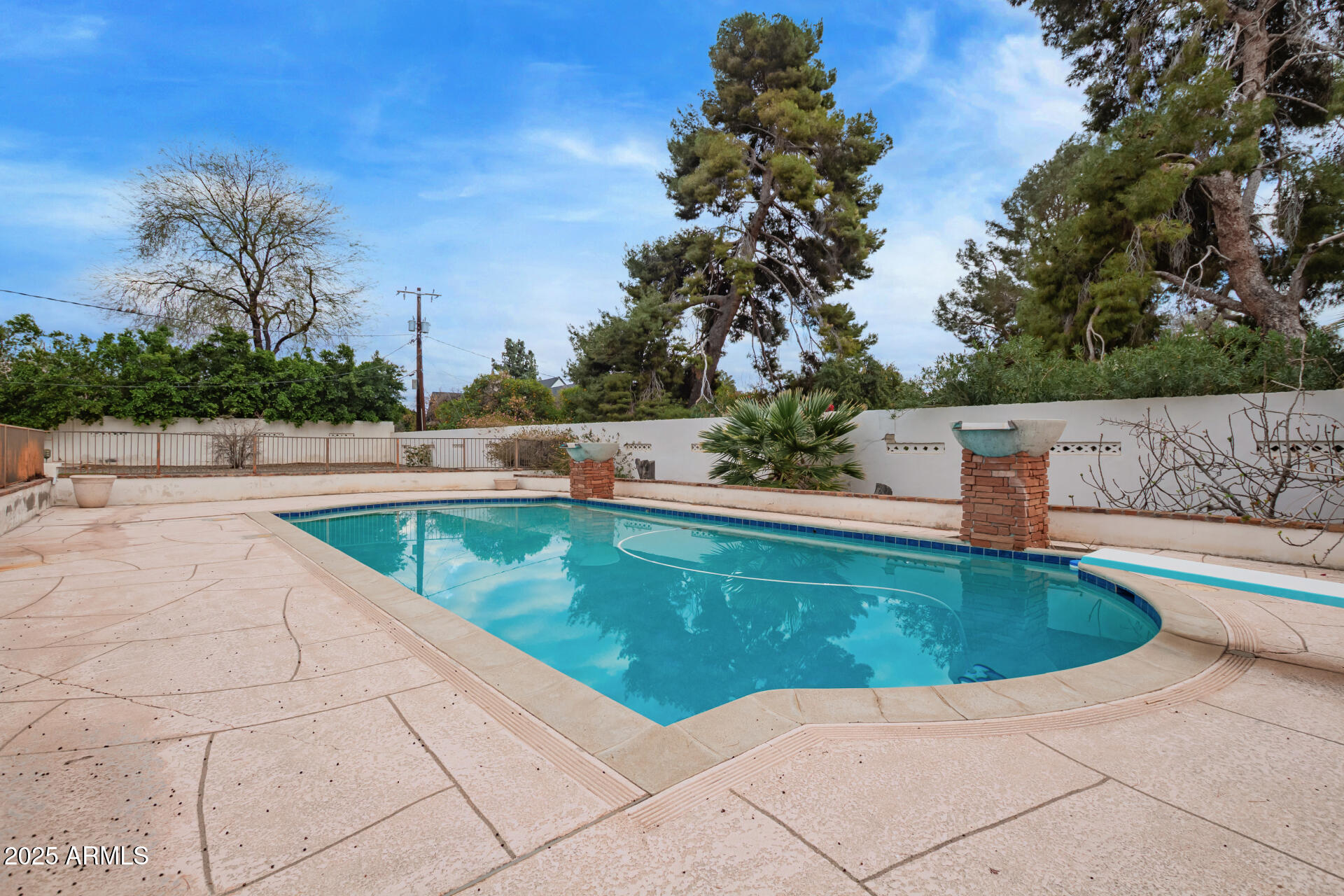 5401 East Exeter Boulevard Phoenix, AZ 85018 - Photo 42 of 47 a view of swimming pool and lounge chair