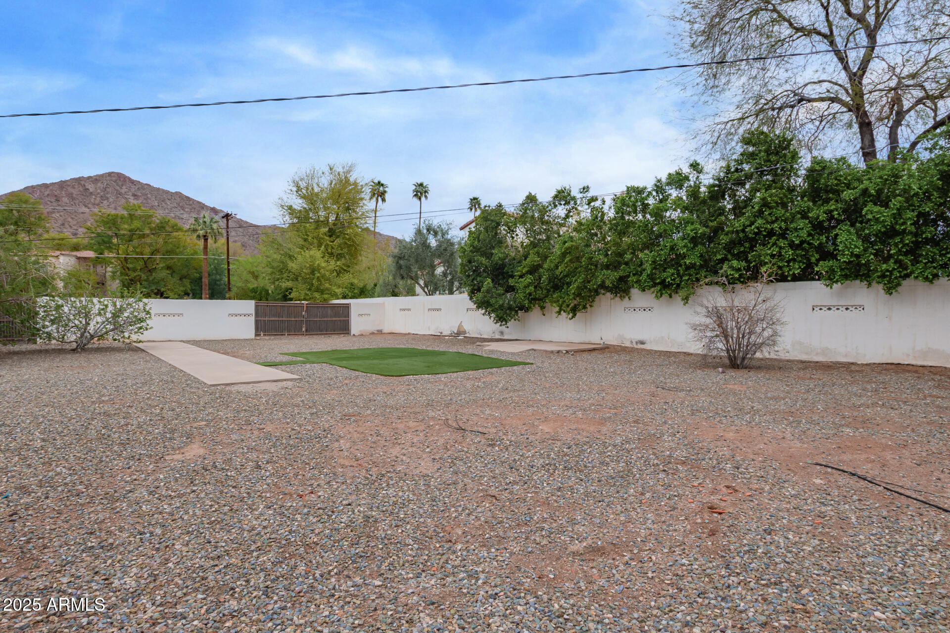 5401 East Exeter Boulevard Phoenix, AZ 85018 - Photo 44 of 47 a backyard of a house with lots of green space