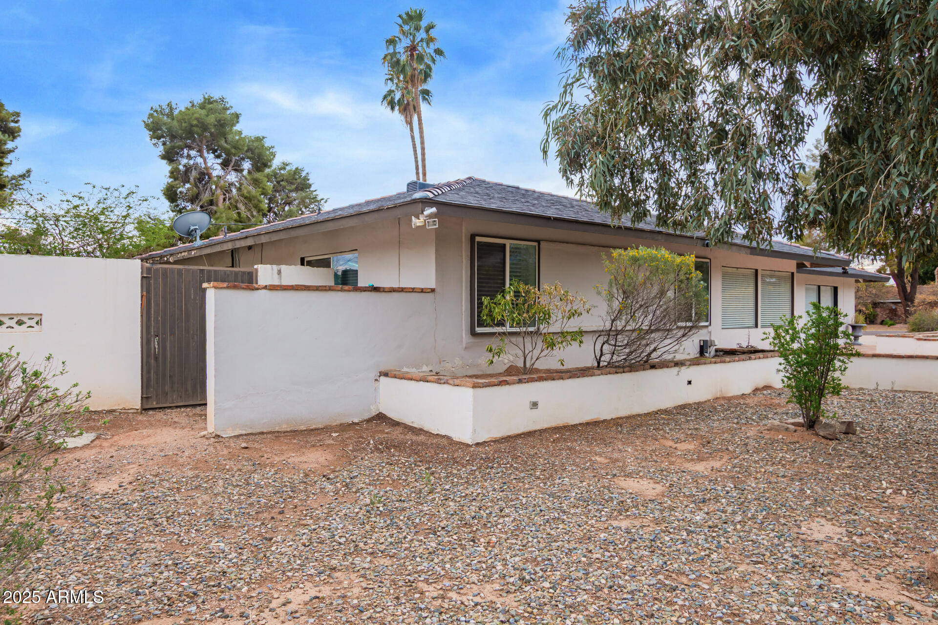 5401 East Exeter Boulevard Phoenix, AZ 85018 - Photo 47 of 47 a front view of a house with garden