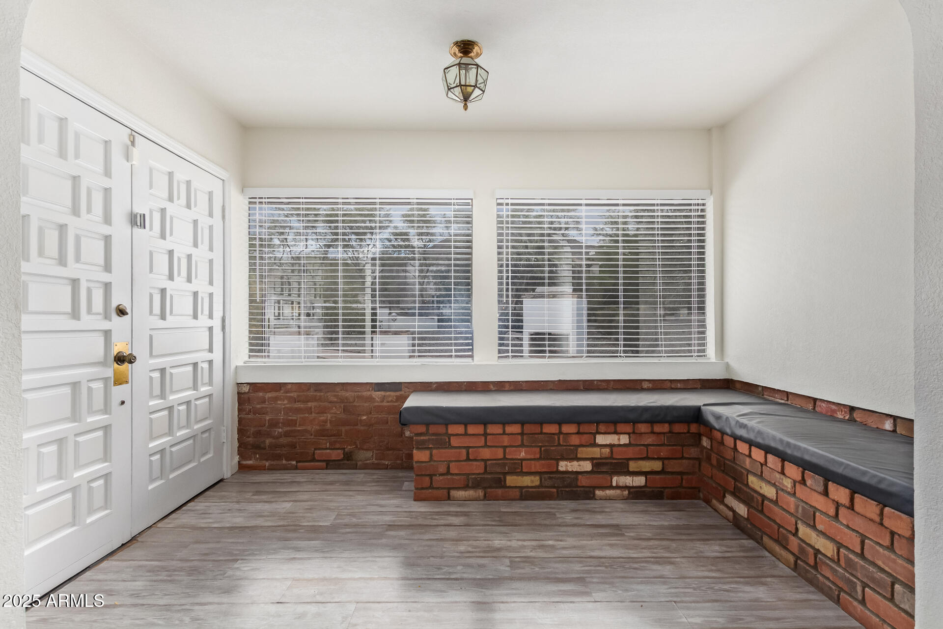 5401 East Exeter Boulevard Phoenix, AZ 85018 - Photo 10 of 47 a view of front door with hallway and stairs