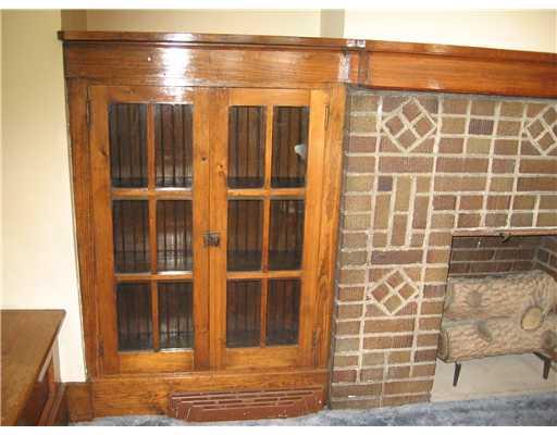 455 Freeport Road Blawnox, PA 15238 - Photo 12 of 18 Dining Room. Detail of fireplace and barrister bookcase in dining room.