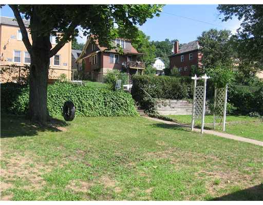 455 Freeport Road Blawnox, PA 15238 - Photo 16 of 18 Yard/Garden. Inviting backyard with 2 off-street parking spaces by fence.