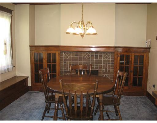 455 Freeport Road Blawnox, PA 15238 - Photo 10 of 18 Dining Room. Window seat, built-ins, and fireplace.