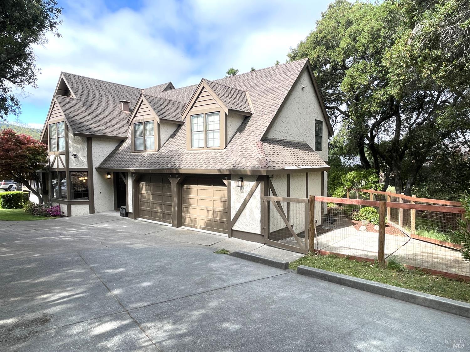 3541 Golf View Terrace Santa Rosa, CA 95405 - Photo 106 of 110 a front view of a house with a yard and garage