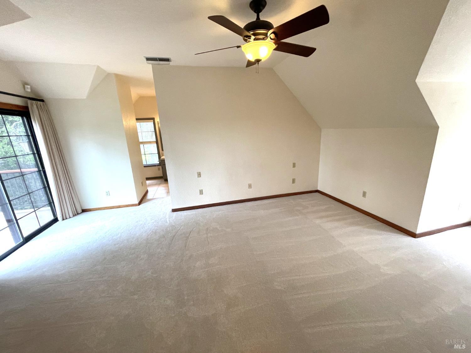 3541 Golf View Terrace Santa Rosa, CA 95405 - Photo 51 of 110 an empty room with windows and fan