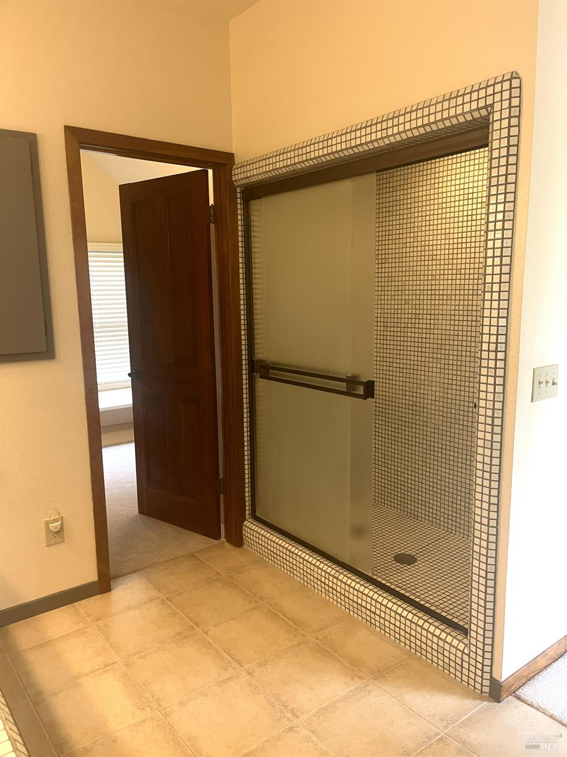 3541 Golf View Terrace Santa Rosa, CA 95405 - Photo 65 of 110 a bathroom with a shower and a glass door