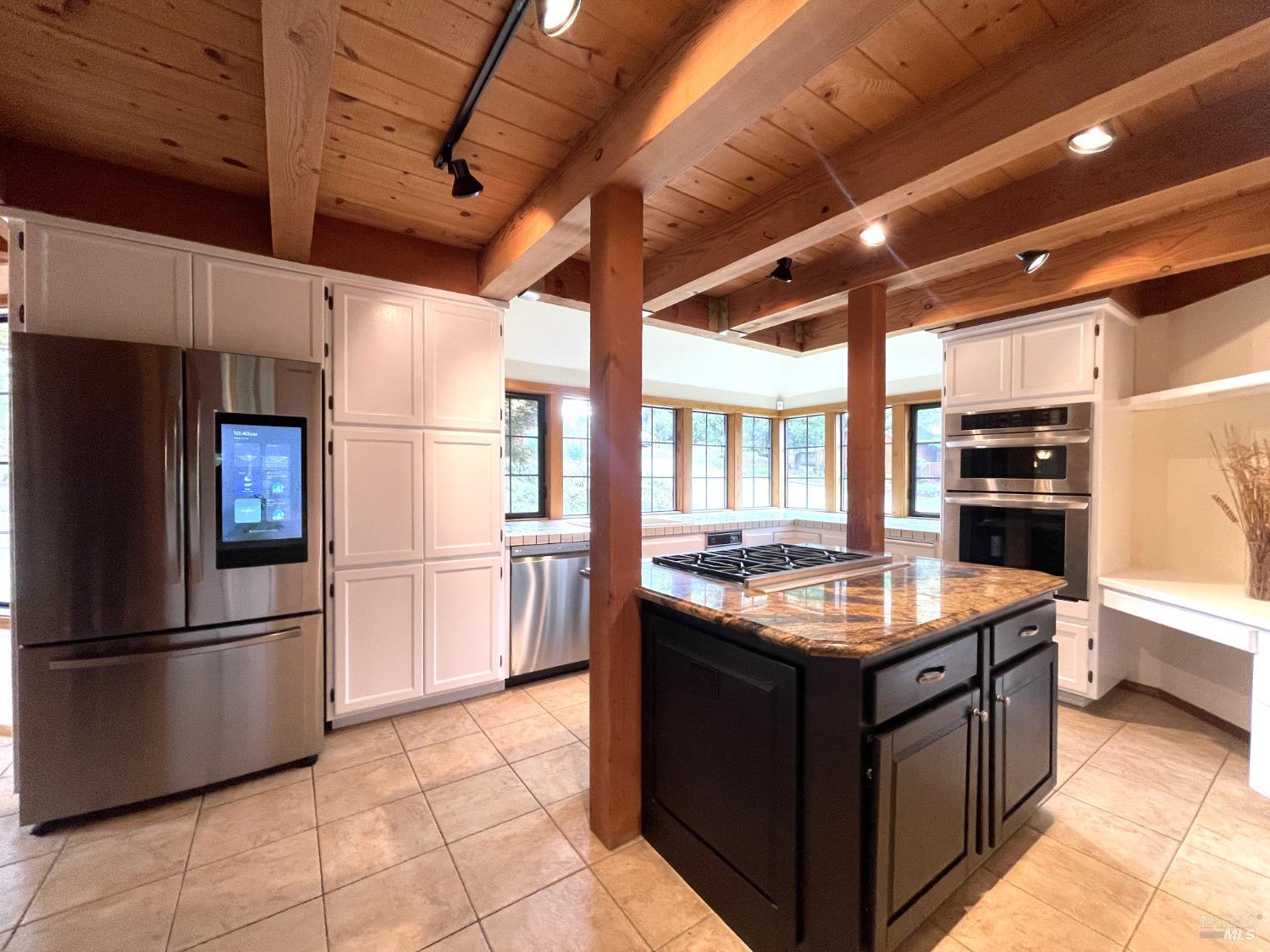 3541 Golf View Terrace Santa Rosa, CA 95405 - Photo 83 of 110 a kitchen with stainless steel appliances granite countertop a stove a refrigerator and a sink