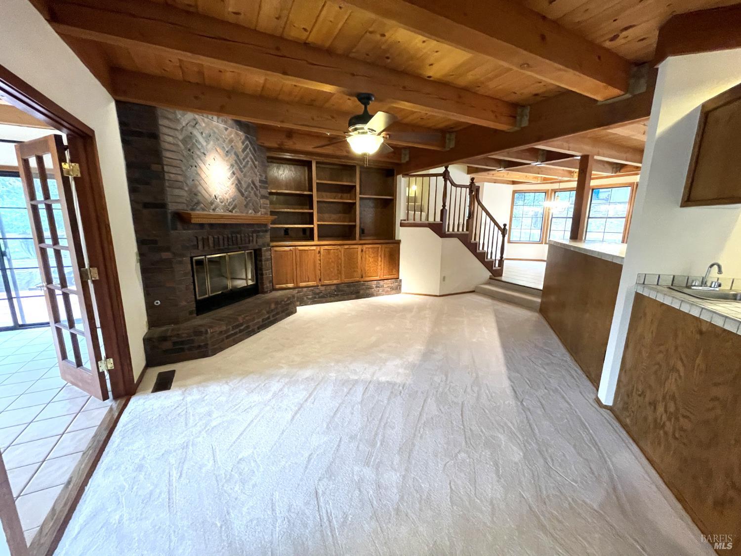 3541 Golf View Terrace Santa Rosa, CA 95405 - Photo 87 of 110 a view of empty room with wooden floor and fireplace