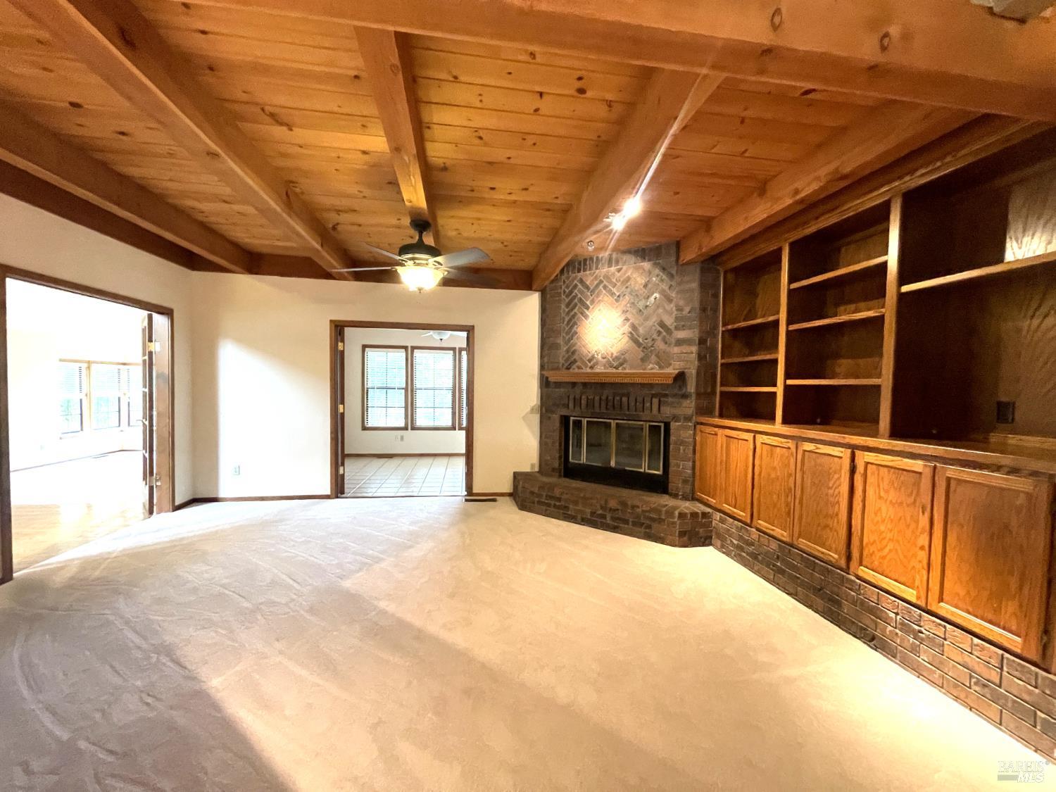 3541 Golf View Terrace Santa Rosa, CA 95405 - Photo 89 of 110 a view of an empty room with a fireplace and a window