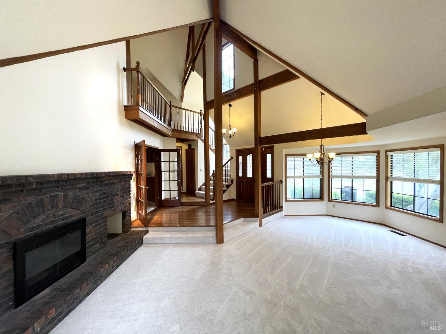 3541 Golf View Terrace Santa Rosa, CA 95405 - Photo 9 of 110 a view of an empty room with a fireplace and a window