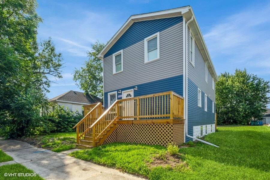 1132 Cleveland Street Hammond, IN 46320 - Photo 2 of 30 a view of a house with a yard
