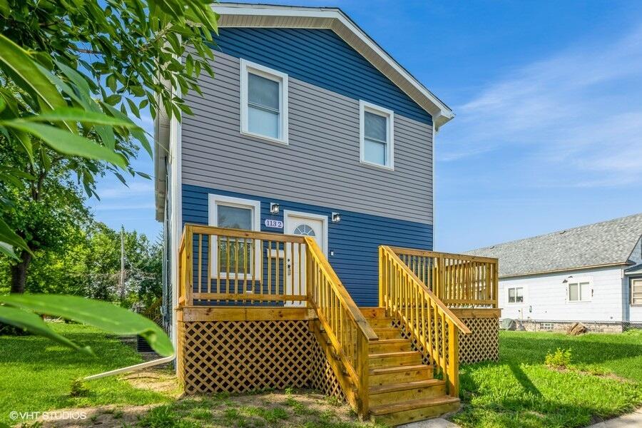 1132 Cleveland Street Hammond, IN 46320 - Photo 3 of 30 a view of a house with a yard