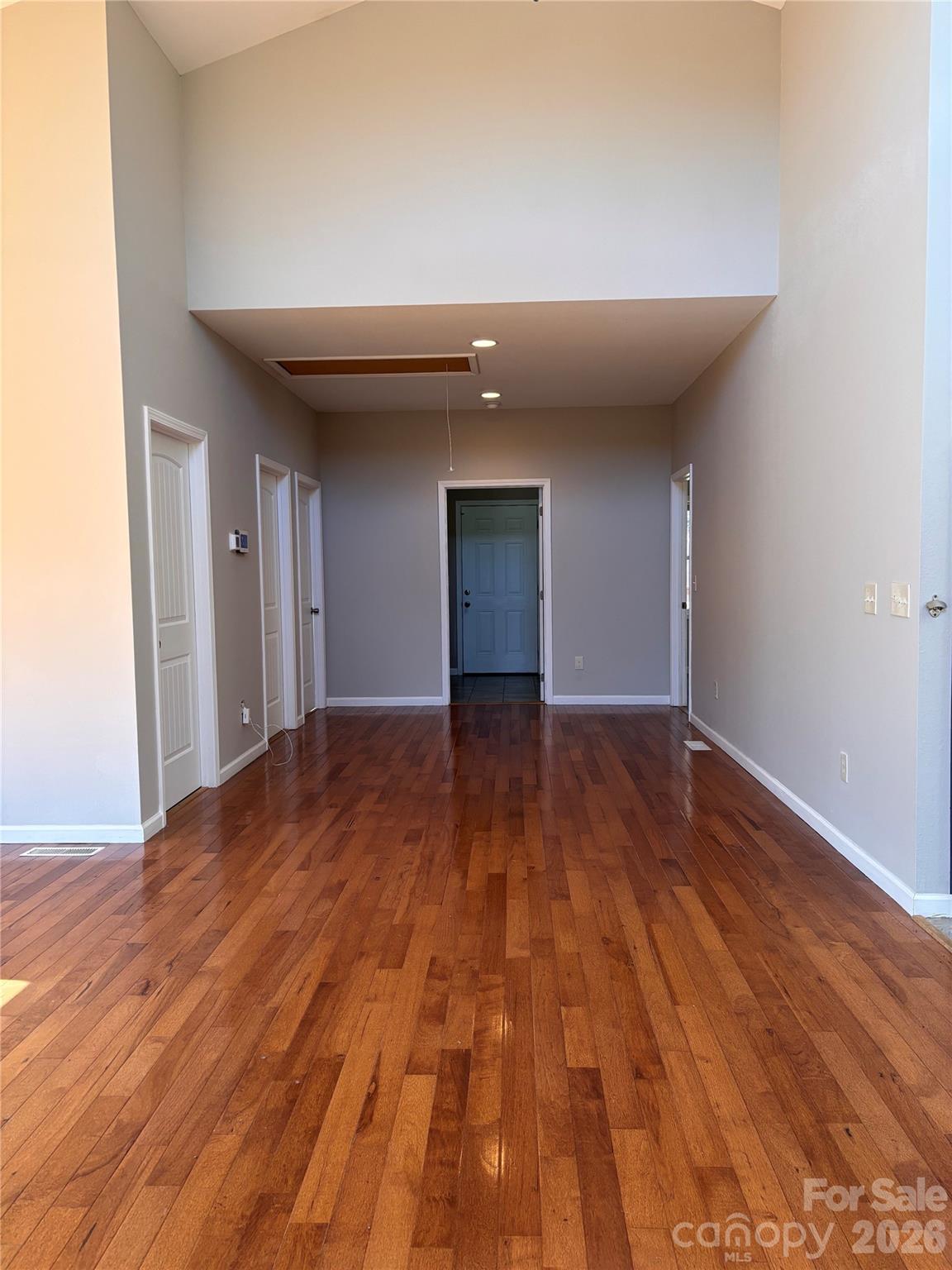 250 Duckett Cove Road Waynesville, NC 28786 - Photo 20 of 23 a view of empty room with wooden floor