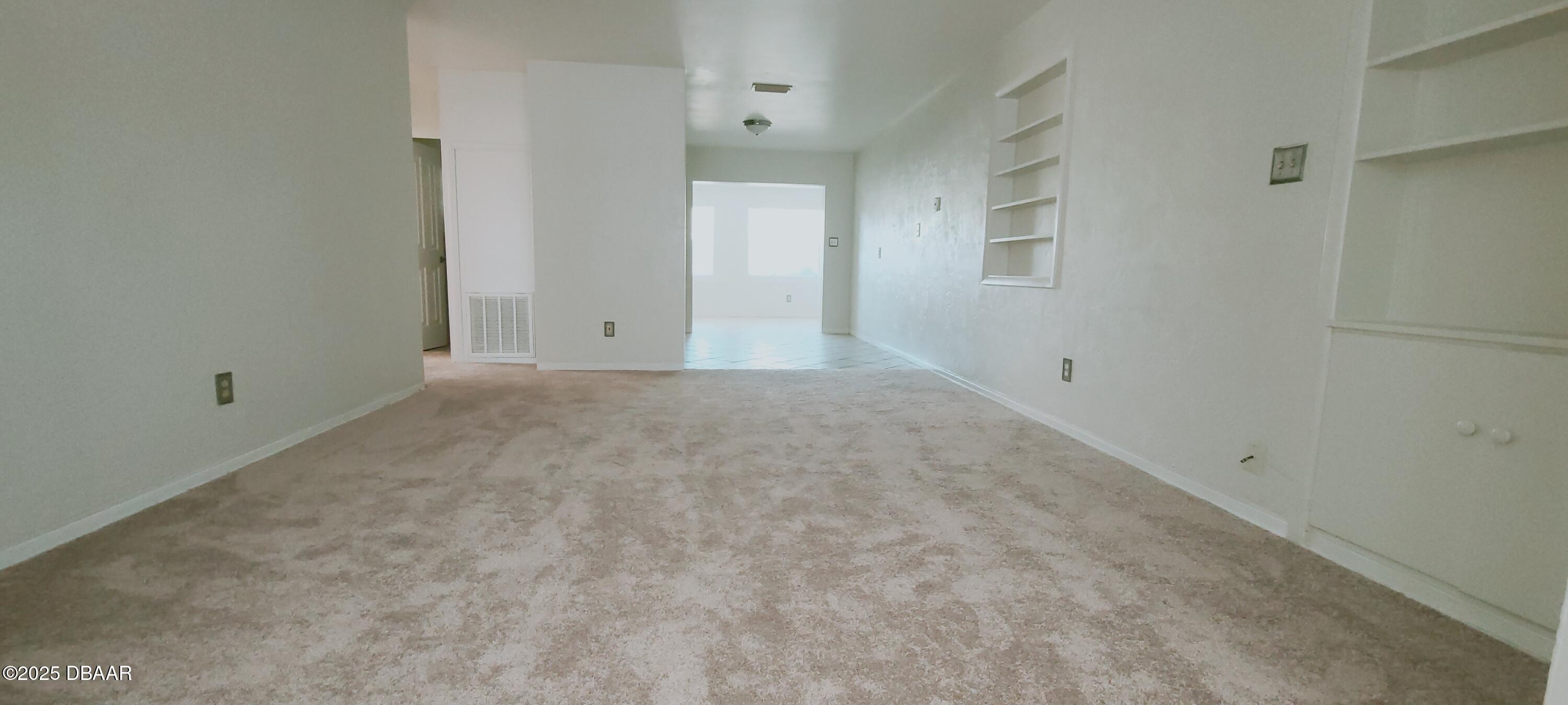 54 Seaside Drive Ormond Beach, FL 32176 - Photo 3 of 12 a view of an empty room