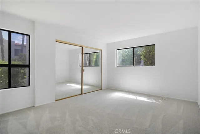 an empty room with windows