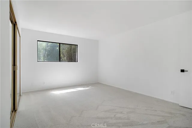 a bathroom with a sink and vanity