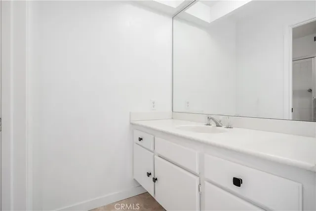 a view of backyard with plants and outdoor seating