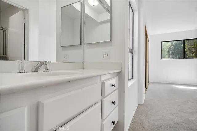 a view of a backyard of the house