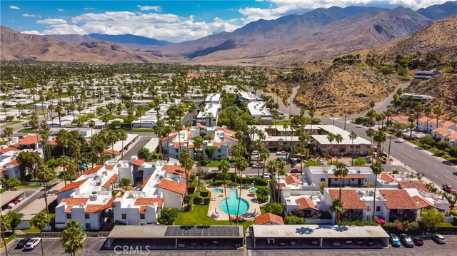 an aerial view of a houses with outdoor space