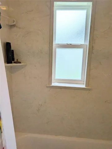 a bathroom with a window