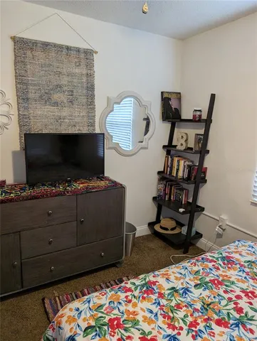 a room with toys and dresser