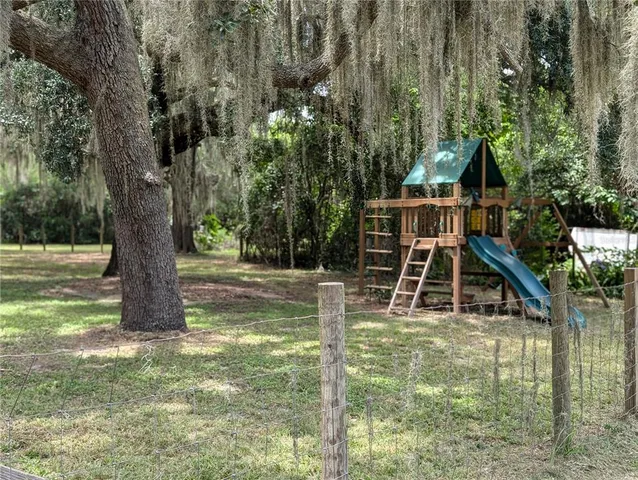a view of backyard with green space