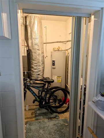 a bathroom with a sink and a window