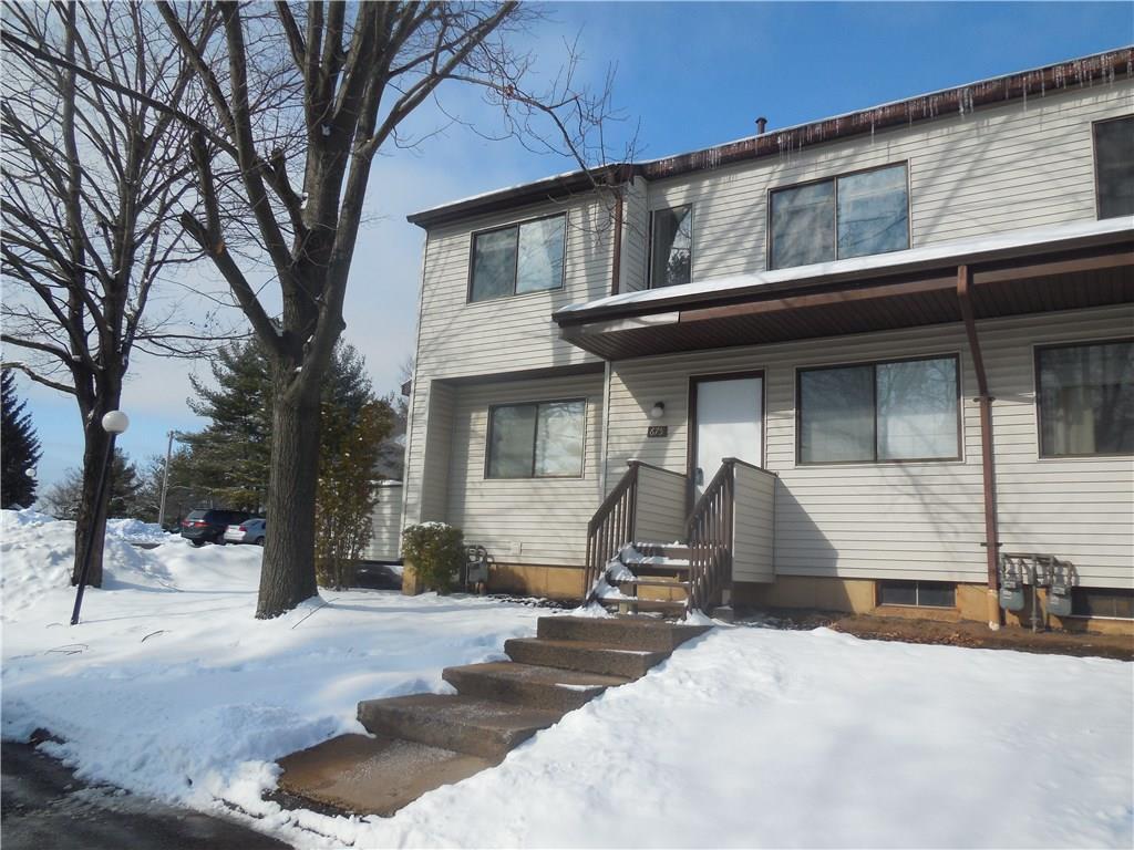 675 Cypress Road, Unit 675 Newington, CT 06111 - Photo 1 of 1 a view of a house with a yard covered in snow