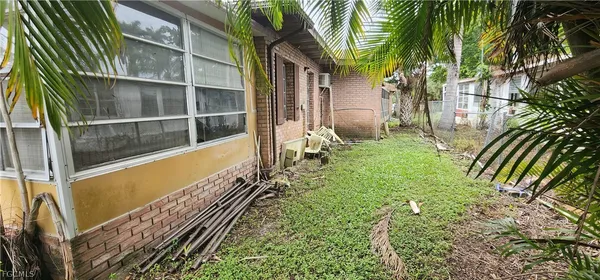 a view of balcony with yard