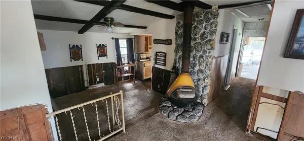 a view of entryway with furniture and livingroom