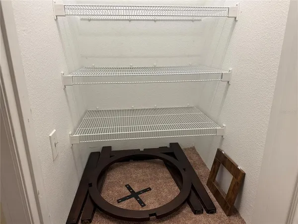 a utility room with washing machine