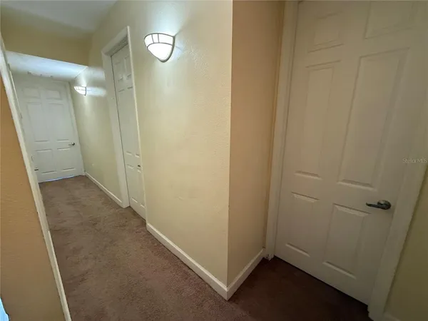 a view of hallway with sink