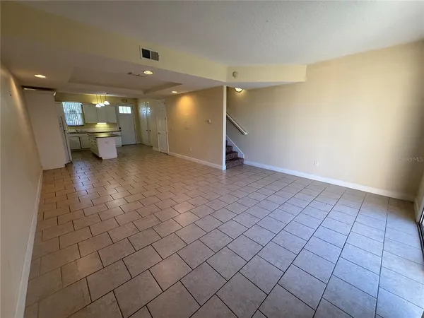 a view of an empty room and window