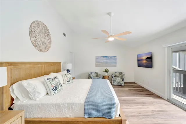 a view of balcony with wooden floor and fence