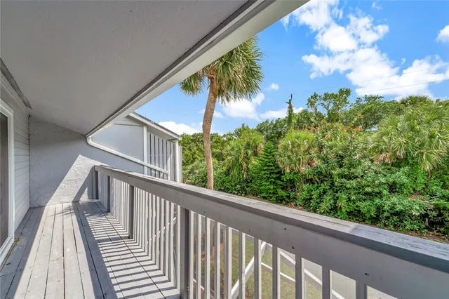 a bathroom with a double vanity sink and a bathtub